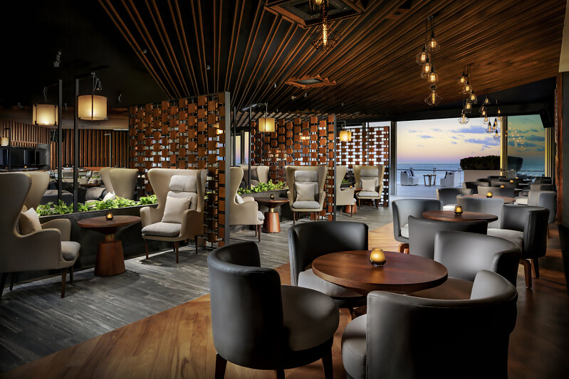 An unexpected guest joins Ashley and Ralph at Grand Velas Los Cabos' Sky Bar in Bravo's Love Hotel episode 6